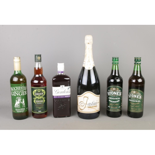 167 - A collection of sealed alcohol, to include Gordon's sloe gin, several bottles of ginger wine and 150... 