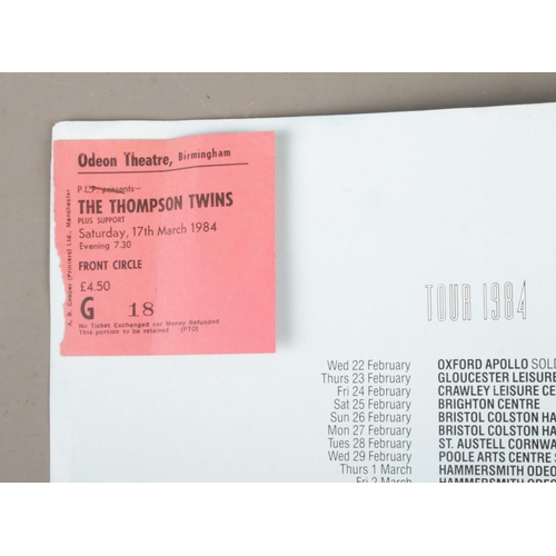 61 - A Thompson Twins 1984 Tour programme, with ticket for The Odeon Theatre, Birmingham. The front cover... 