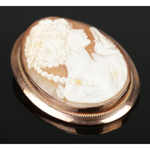 A 9ct rose gold mounted cameo brooch. Total weight 8.77g