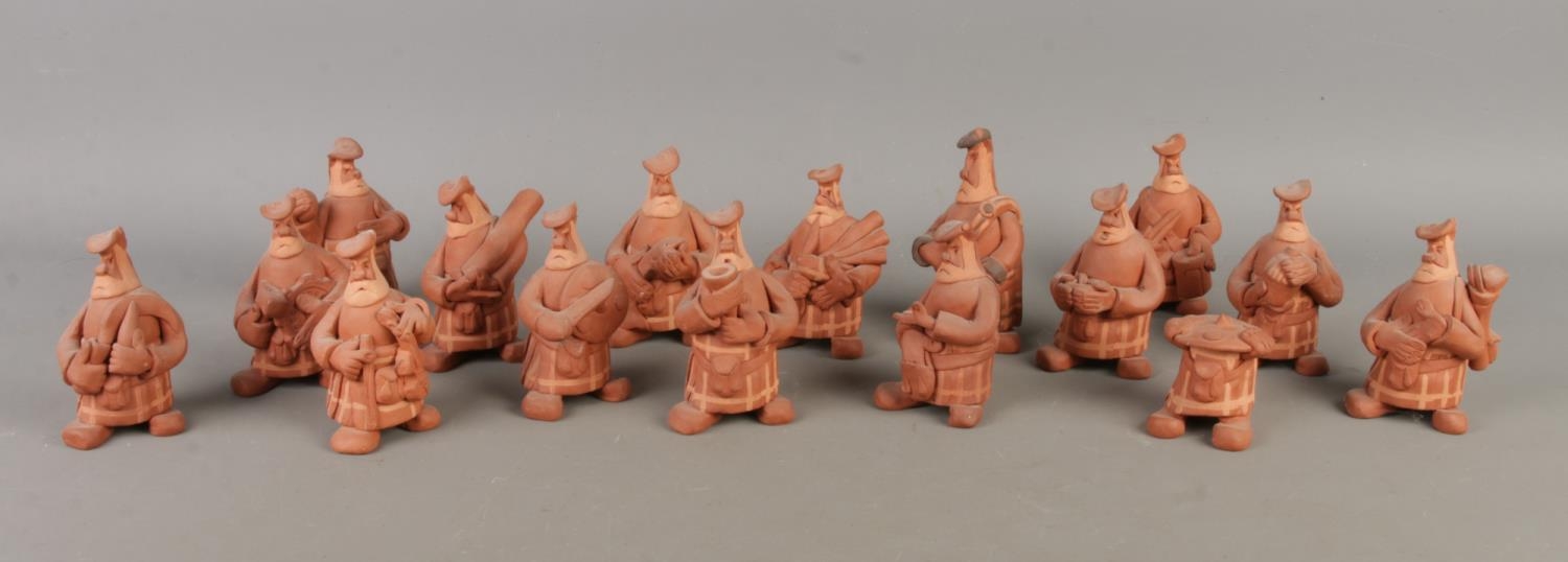 Sixteen 'Men Of Glaur' clay figures by Scottish artist Robin Coutts.