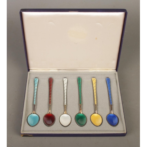 A cased set of Ela Danish silver and enamel demitasse spoons.