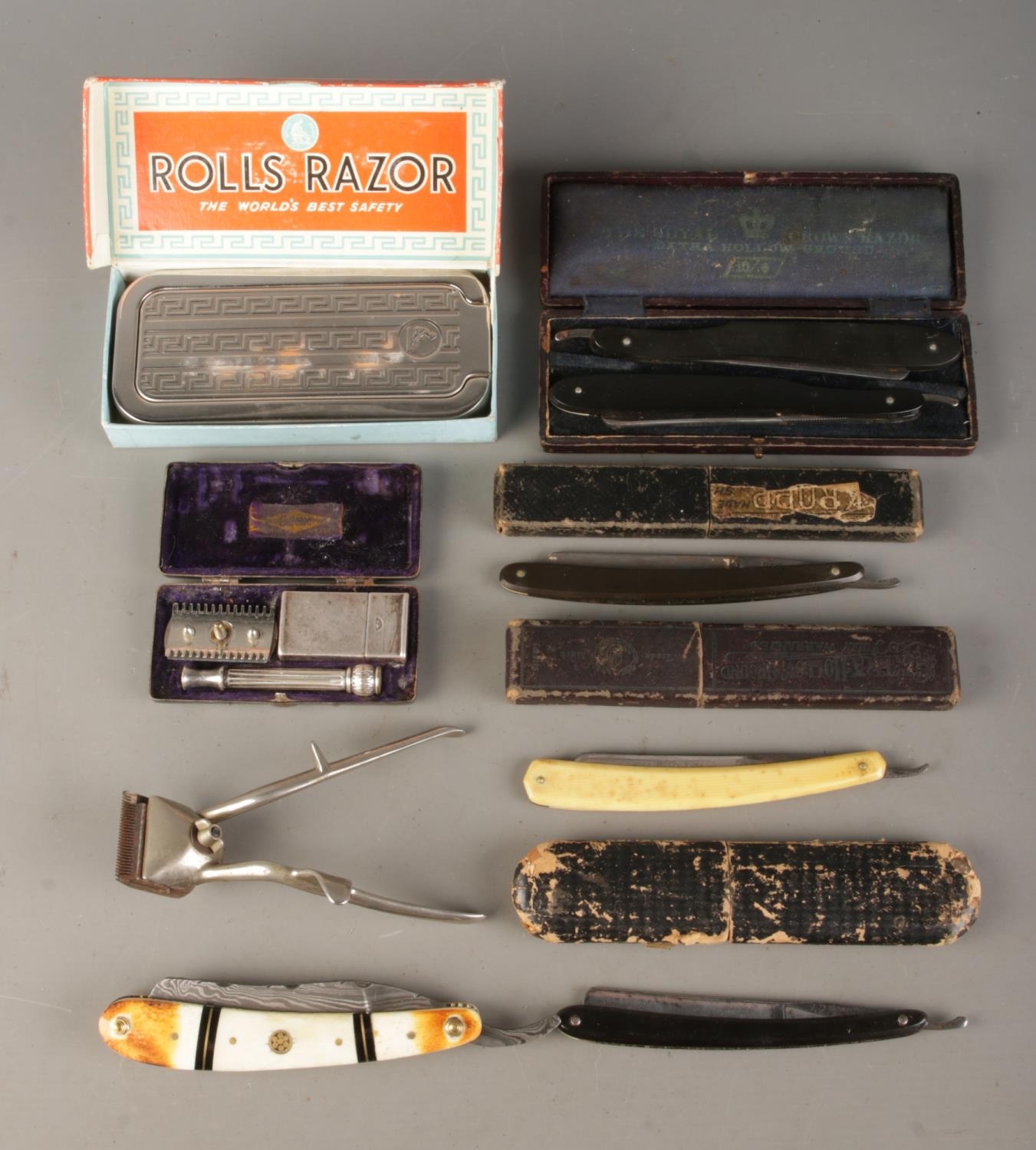 A collection of vintage razors, clippers and cut throat razors. To ...