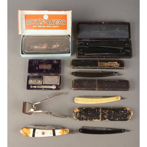 A collection of vintage razors, clippers and cut throat razors. To ...