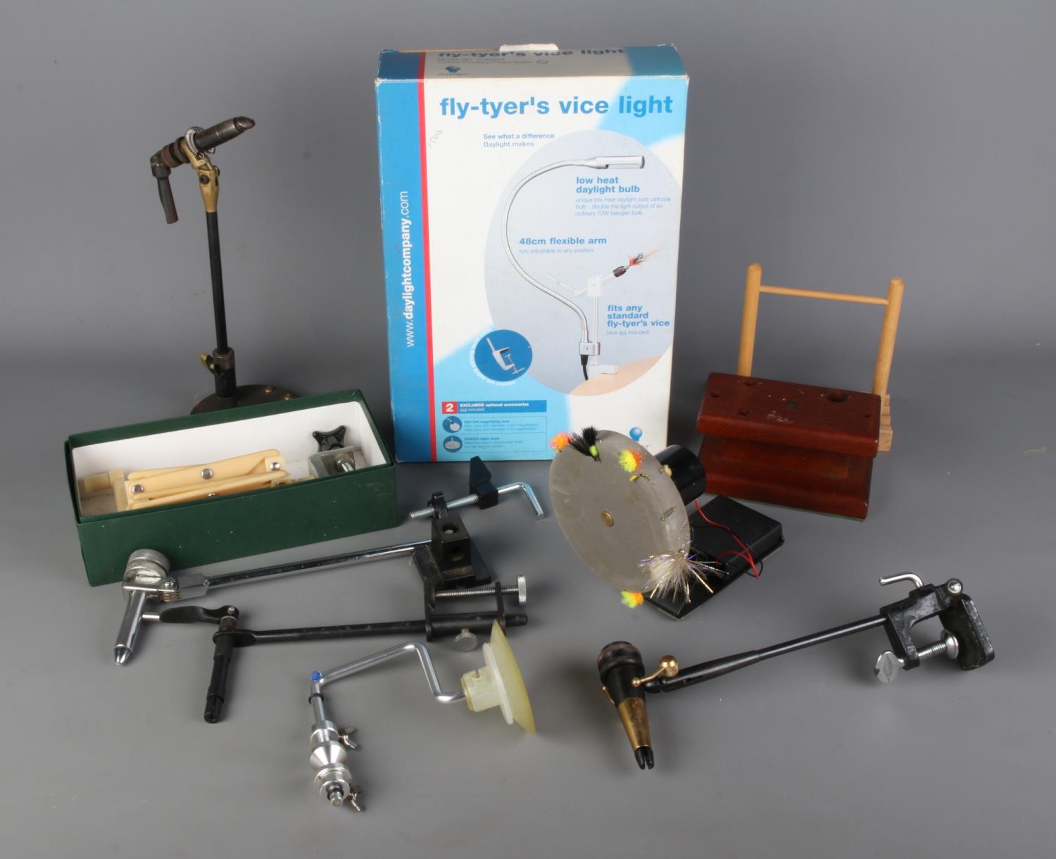 A collection of fly fishing fly tying vices to include boxed Daylight ...