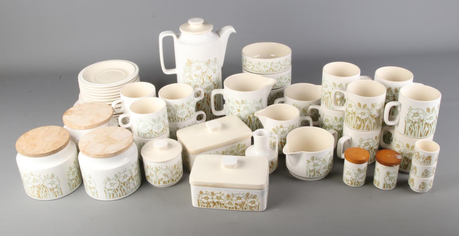A box of Hornsea Pottery Fleur pattern ceramics.