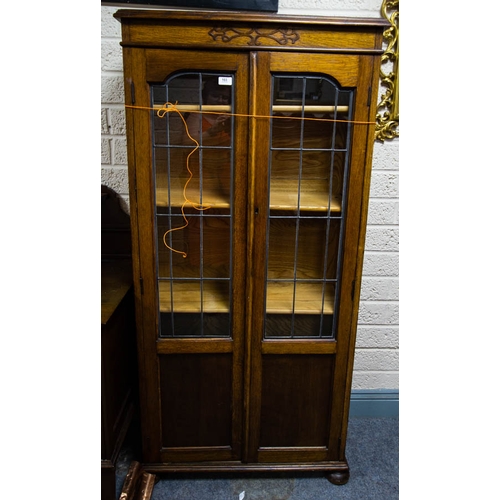 103 - 2 DOOR LEADED GLASS OAK BOOKCASE