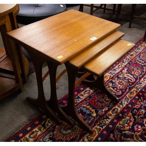 521 - NEST OF 3 MID-CENTURY TEAK TABLES

52cm high , 56cm wide, 40cm deep