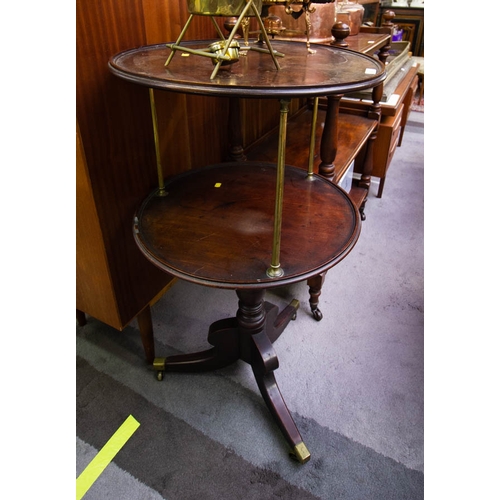 531 - GEORGIAN MAHOGANY CIRCULAR 2 TIER DUMBWAITER WITH BRASS COLUMNS

113cm high, 61cm deep.