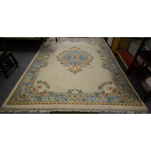 554 - CREAM WOOL RUG WITH BLUE MEDALLION + BORDER

270cm x 360cm