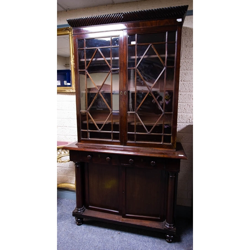 66 - MAHOGANY DIAMOND DOOR BOOKCASE WITH PILLAR BASE. 120CM W X 215CM H X 46CM D