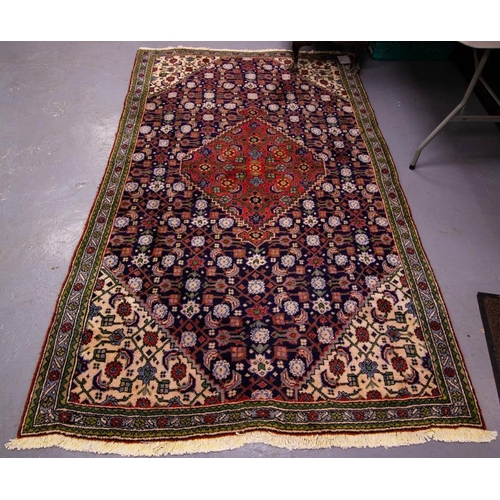 87 - RICH INDO PERSIAN BLUE GROUND RUG. 150 X 260CM