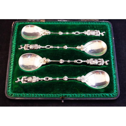 12 - 4 DECORATIVE SILVER SPOONS  IN CASE . LONDON 1901 . 150 GRAMS
