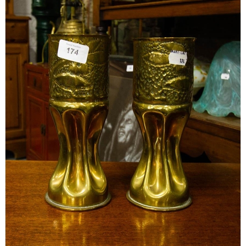 174 - PAIR OF SHAPED  BRASS SHELLS