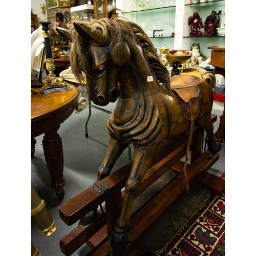31 - CARVED WOODEN ROCKING HORSE