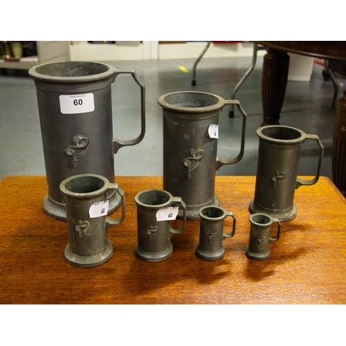 60 - SET OF 7 GRADUATED PEWTER STEINS