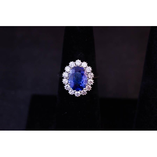 264 - 18K WHITE GOLD SAPPHIRE + DIAMOND RING. SAPPHIRE 3.74CT, DIAMOND 1.26CT, SIZE N WITH CERTIFICATE