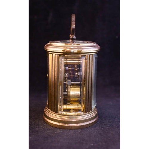 276 - OVAL FRENCH BRASS CARRIAGE CLOCK