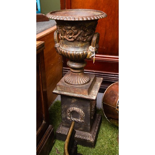 114 - PAIR OF VICTORIAN CAST IRON PLANT URNS ON PLINTHS (69 CM HIGH) - ANDREW HANDYSIDE FOUNDRY