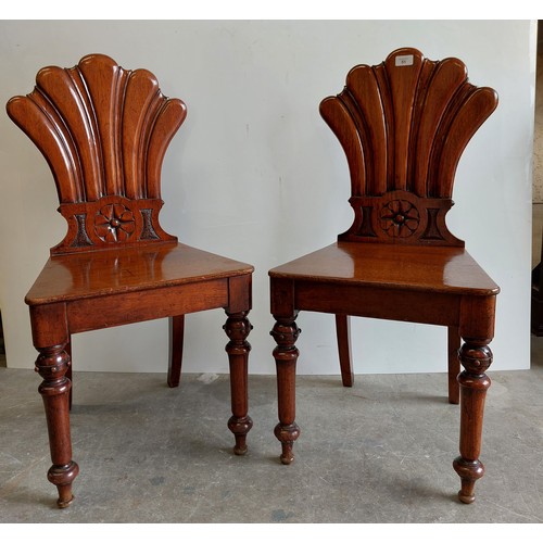 PAIR OF ANTIQUE HALL CHAIRS WITH SHAPED HALL BACKS