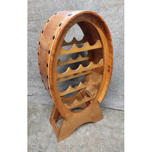 68 - SHAPED PINE 14 BOTTLE WINE HOLDER.
89CM HIGH