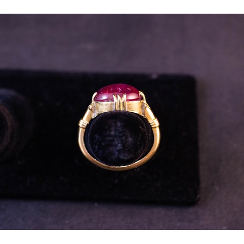 45 - 18KT CUSTOM MADE CAPUCHON RUBY RING. SIZE N. 3CT. APPROX.