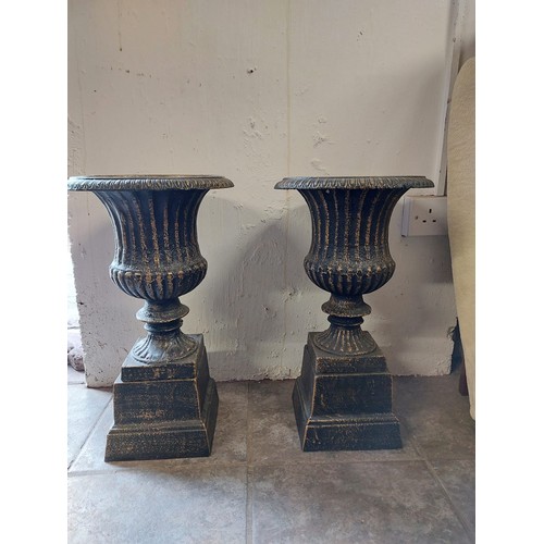 152 - PAIR OF CAST IRON URNS ON PLINTHS
50CM H