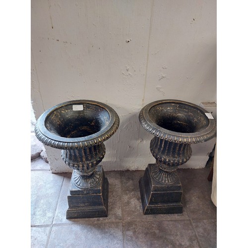 152 - PAIR OF CAST IRON URNS ON PLINTHS
50CM H