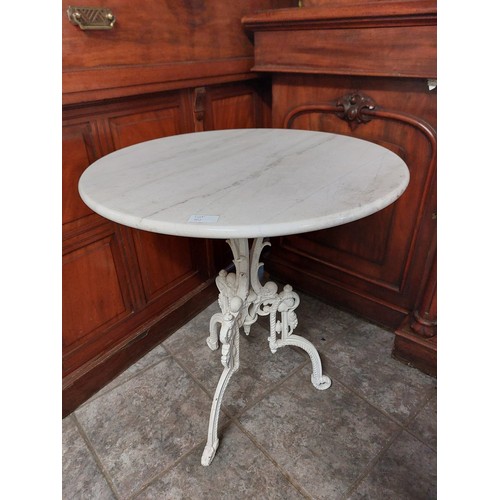 151 - MARBLE TOP TABLE WITH ORNATE CAST IRON TRIPOD BASE
60CM W, 67CM H