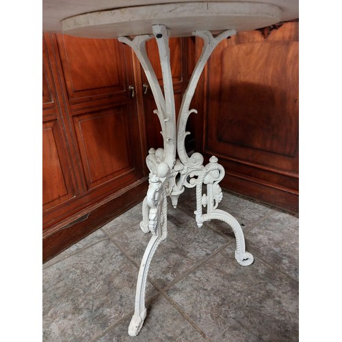 151 - MARBLE TOP TABLE WITH ORNATE CAST IRON TRIPOD BASE
60CM W, 67CM H