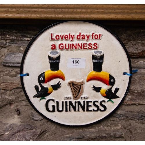 160 - ROUND CAST IRON GUINNESS SIGN 24CM DIAM