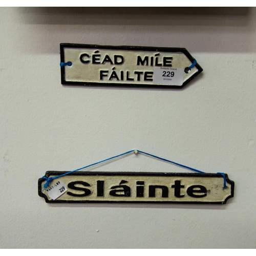 229 - 2 SMALL CAST SIGNS - SLAINTE + CEAD MILE FAILTE