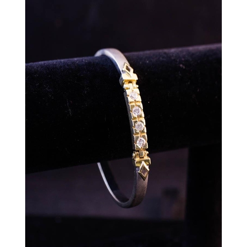 181 - 14K WHITE + YELLOW GOLD BANGLE WITH 4 DIAMONDS 12.8G