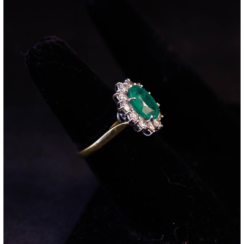 186 - 18K YELLOW GOLD EMERALD + DIAMOND CLUSTER RING