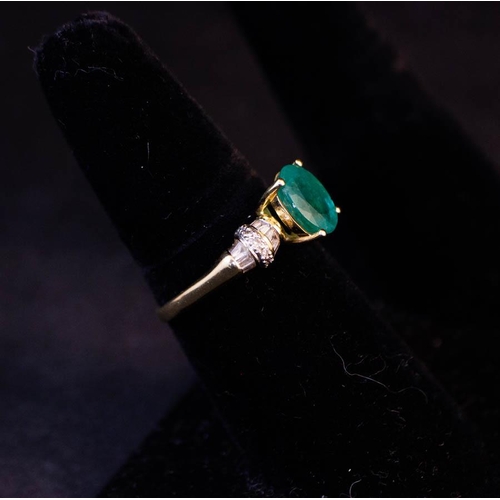 187 - OVAL EMERALD RING WITH DIAMOND BAGUETTE SHOULDERS IN 14K YELLOW GOLD