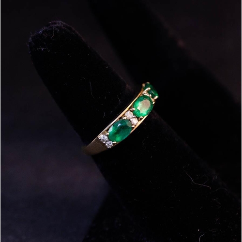 188 - EMERALD + DIAMOND BAND SET IN 9K YELLOW GOLD