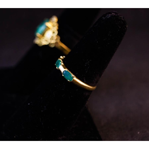 190 - 2X 18K YELLOW GOLD + EMERALD RINGS - 1 FILIGREE + 1 BAND WITH 3 EMERALDS INSET