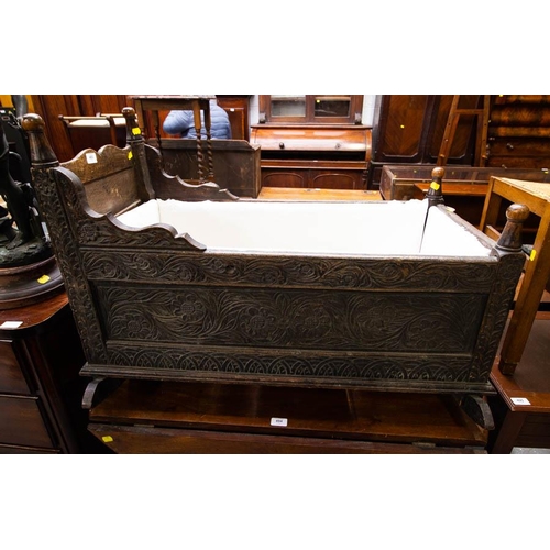 493 - 19TH CENTURY TUDOR STYLE CHILDS CRADLE