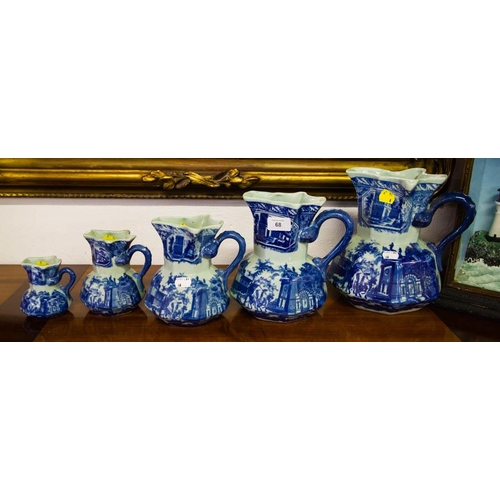 68 - SET OF 5 BLUE JUGS