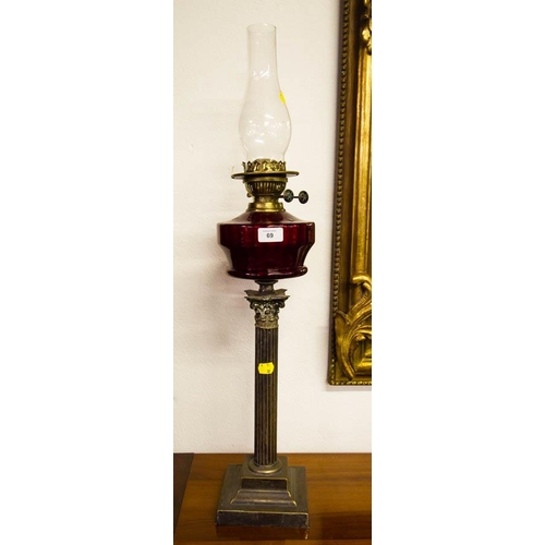 69 - BRASS OIL LAMP WITH RED BOWL. 80CM HIGH