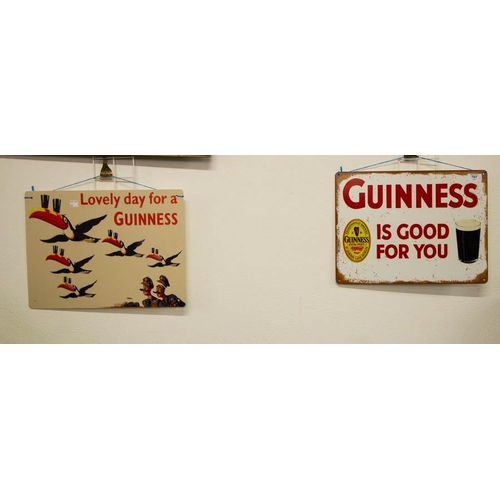 707 - 2 GUINNESS TIN SIGNS