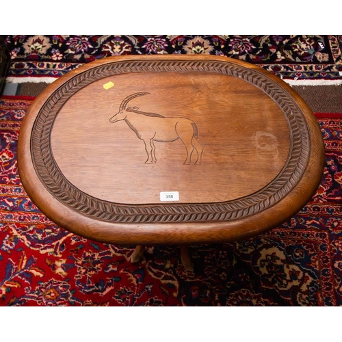 358 - CARVED OVAL TOP EASTERN TABLE