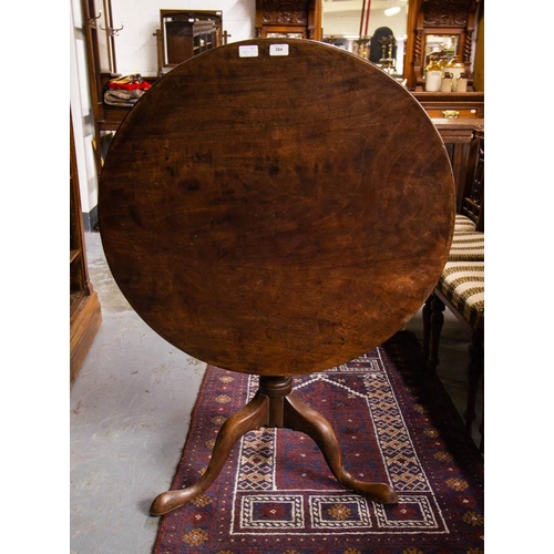 384 - GEORGIAN  MAHOGANY TIP UP TABLE ON POD. 83CM DIAMETER