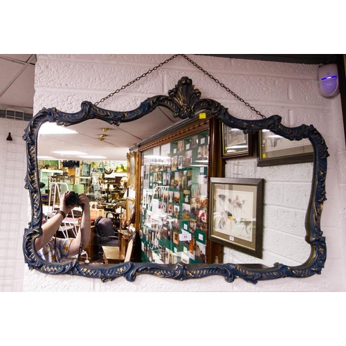 63 - PAINTED SHAPED OVERMANTLE MIRROR. 100 X 65CM