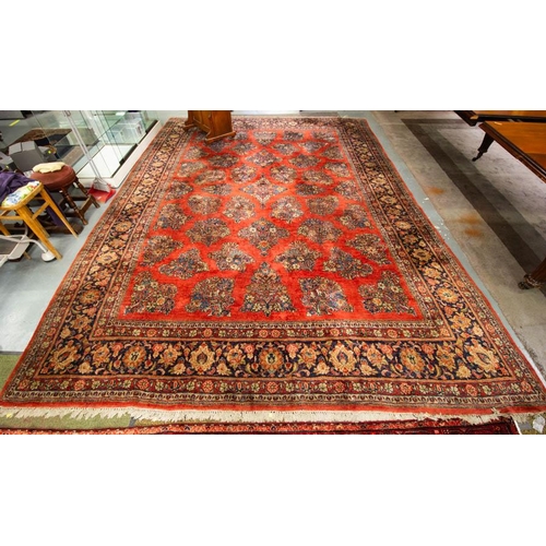 319 - CLARET GROUND WOOL RUG 427 X 309CM