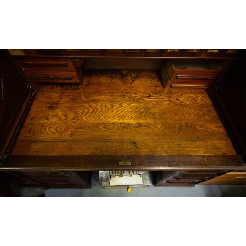 146 - OAK ROLL TOP DESK 137W x 89D x 130H in cm