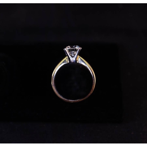 270 - SINGLE STONE DIAMOND SET IN 14K YELLOW + WHITE GOLD, BRILLIANT CUT IN 4 CLAW SETTING. TOTAL DIAMOND ... 