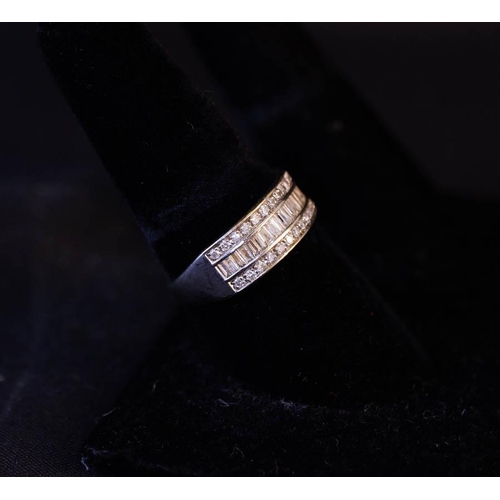 273 - 9K GOLD CHANNEL SET BAGUETTE DIAMOND RING, SIZE T