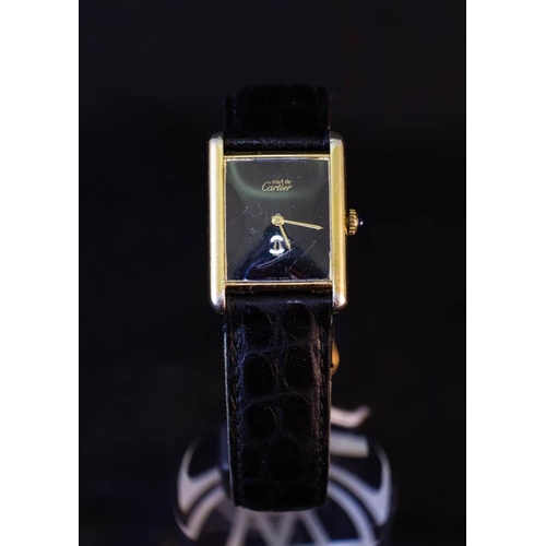 274 - CARTIER TANK LADIES WATCH GOLD ON SILVER MANUAL WIND WITH SAPPHIRE WINDER AND LEATHER STRAP. 30MM X ... 