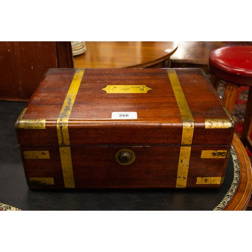 GEORGIAN MAHOGANY BRASS BOUND BOX FILLED WITH SILVER TOPPED BOXES, BOTTLES + MOTHER OF PEARL HANDLED ITEMS. SILVER LONDON 1857, DISTRIBUTED BY THOS + GEO AUSTIN, 6-7 ST ANDREWS ST, DUBLIN