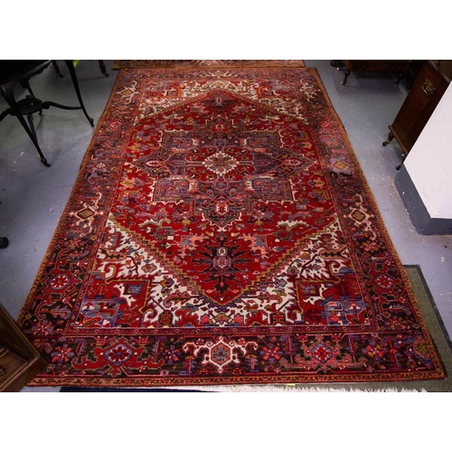152 - RED GROUND WOOL RUG WITH DIAMOND PATTERS . 200 X 290 CM